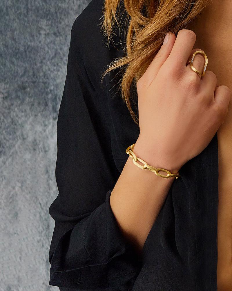 "Libera" gouden schakelarmband met diamanten