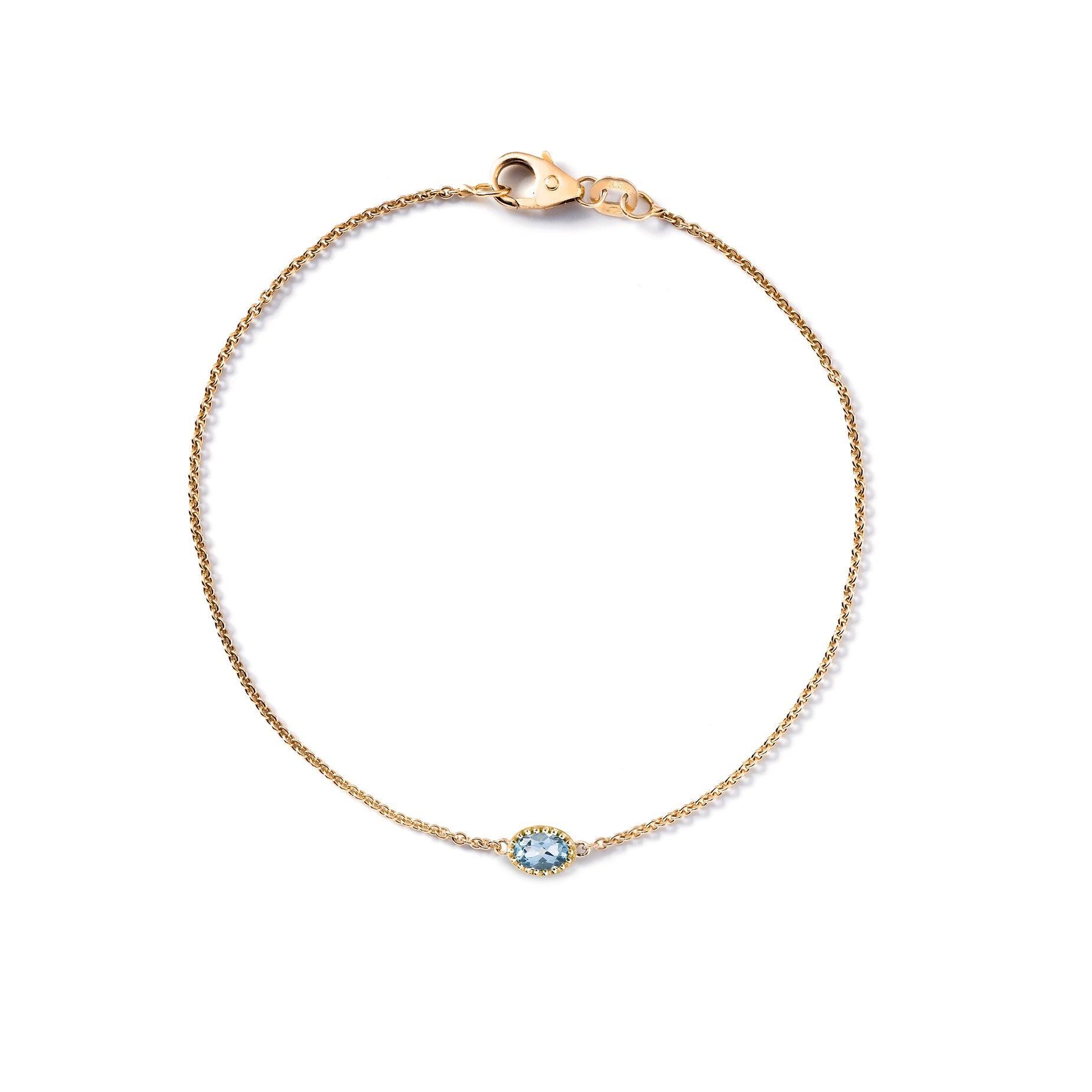 ARMBAND 'MA PETITE' MET BLAUWE TOPAAS